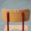 Stackable chair in varnished beech plywood and powder coated steel