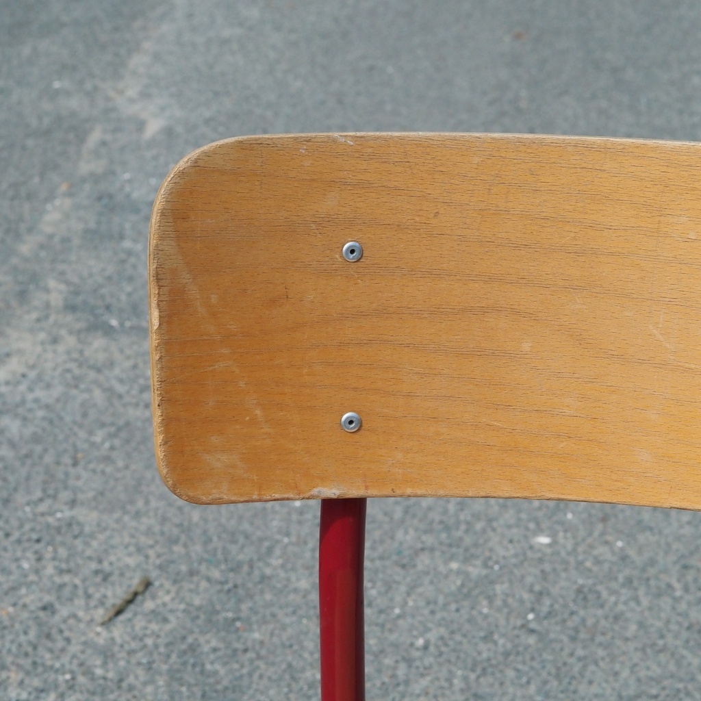 Stackable chair in varnished beech plywood and powder coated steel