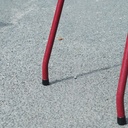 Stackable chair in varnished beech plywood and powder coated steel