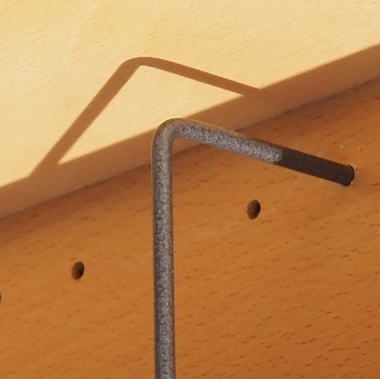 Steel rod divider for display rack