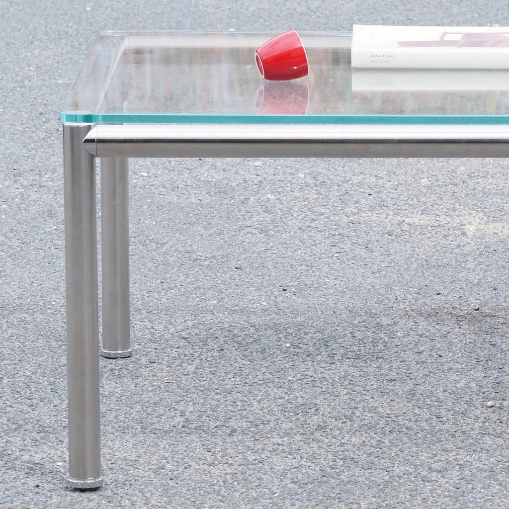 Coffee table in chromed steel with smoked glass tabletop and rotating tablets