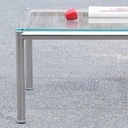 Coffee table in chromed steel with smoked glass tabletop and rotating tablets