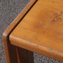 Stackable chair in varnished beech plywood and powder coated steel