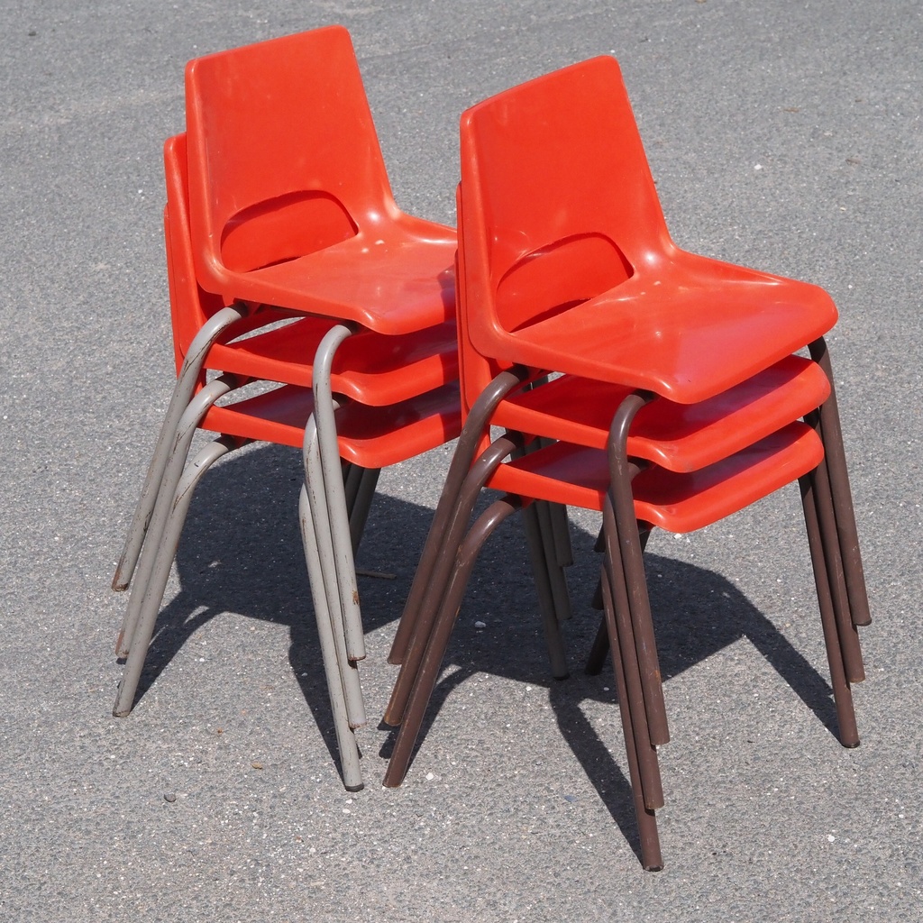 Stackable chair in varnished beech plywood and powder coated steel