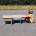 Low school table with wooden laminated table top and colorful lacquered steel legs (H. 46 cm)