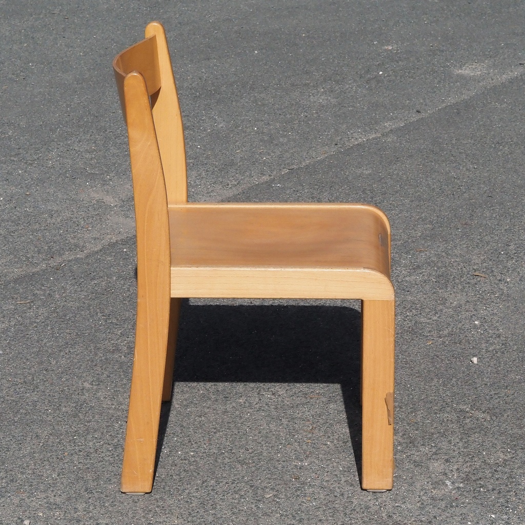 Stackable chair in varnished beech plywood and powder coated steel