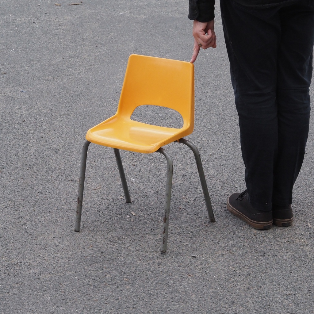 Stackable chair in varnished beech plywood and powder coated steel