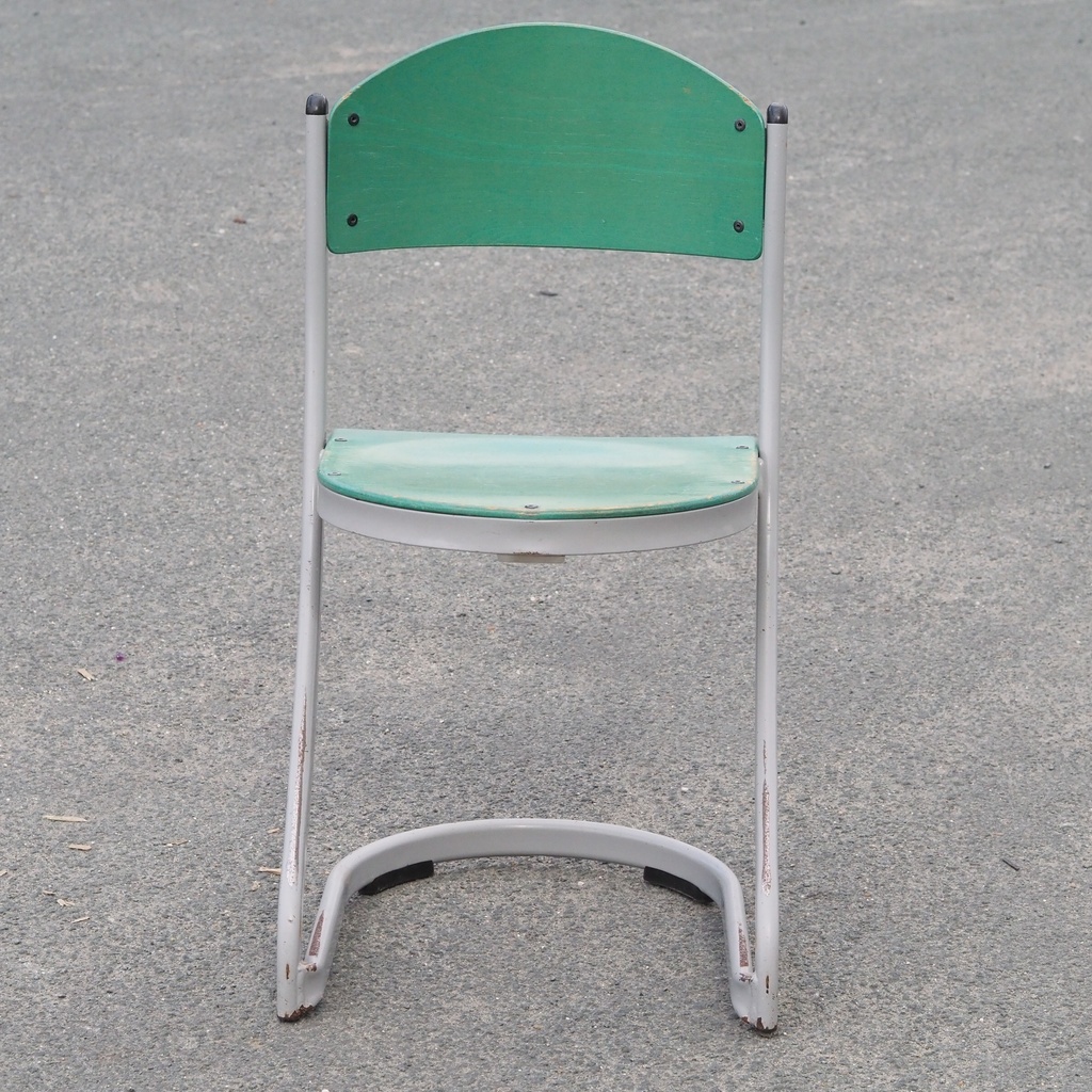 Stackable chair in varnished beech plywood and powder coated steel