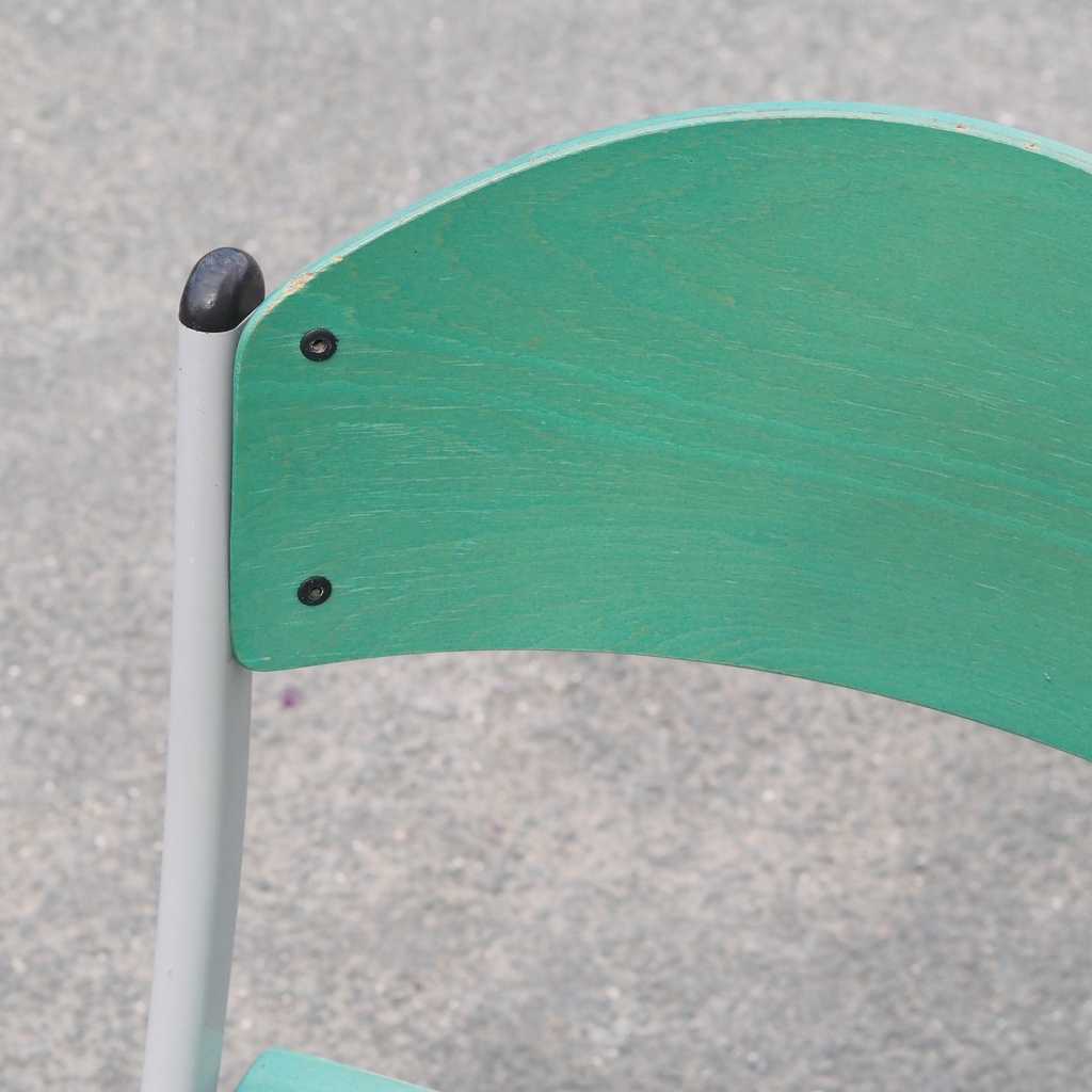 Stackable chair in varnished beech plywood and powder coated steel
