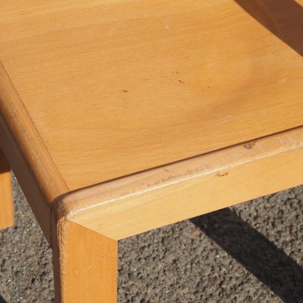 Stackable chair in varnished beech plywood and powder coated steel