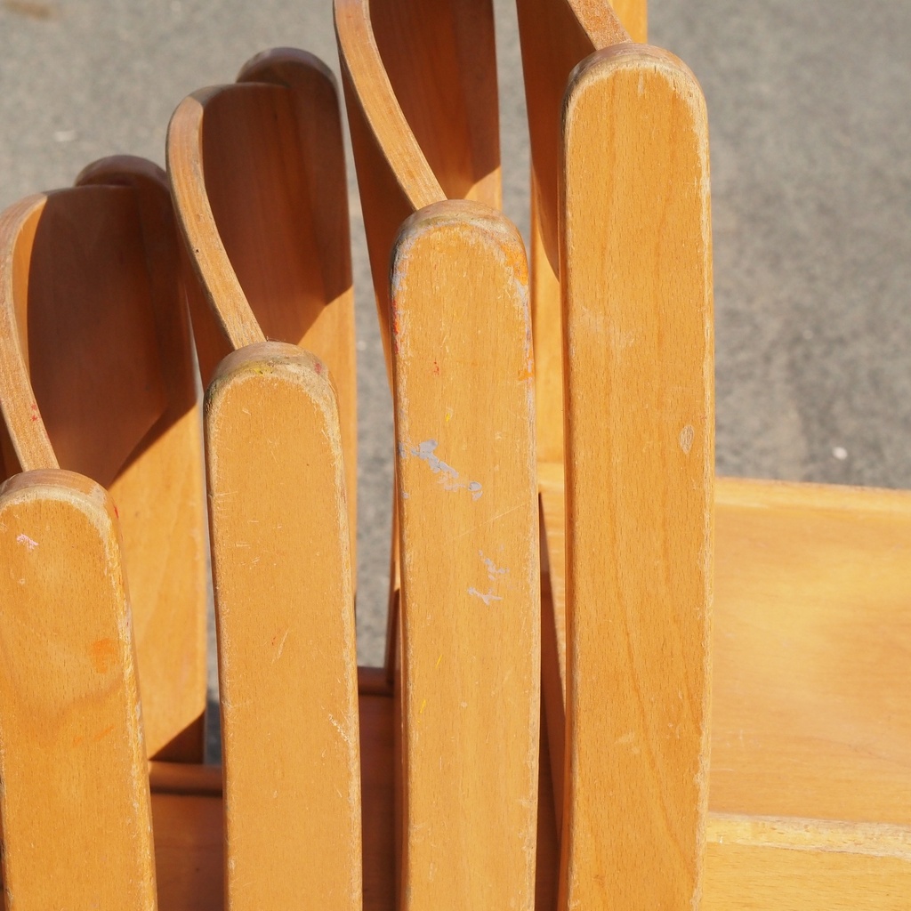 Stackable chair in varnished beech plywood and powder coated steel