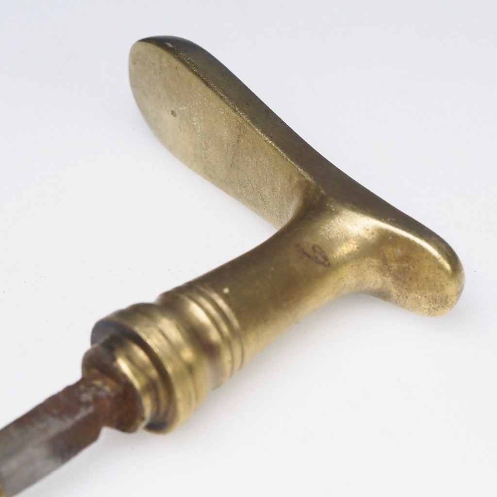 Door handle in solid brass