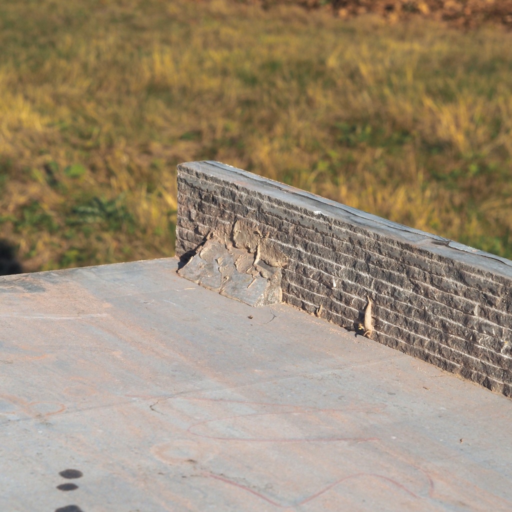Grooved blue limestone slabs with integral upstand