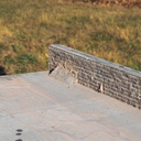 Grooved blue limestone slabs with integral upstand