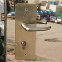 Door in stainless steel with bronze door handles by Jules Wabbes (H. 198 x 53 cm) – Right