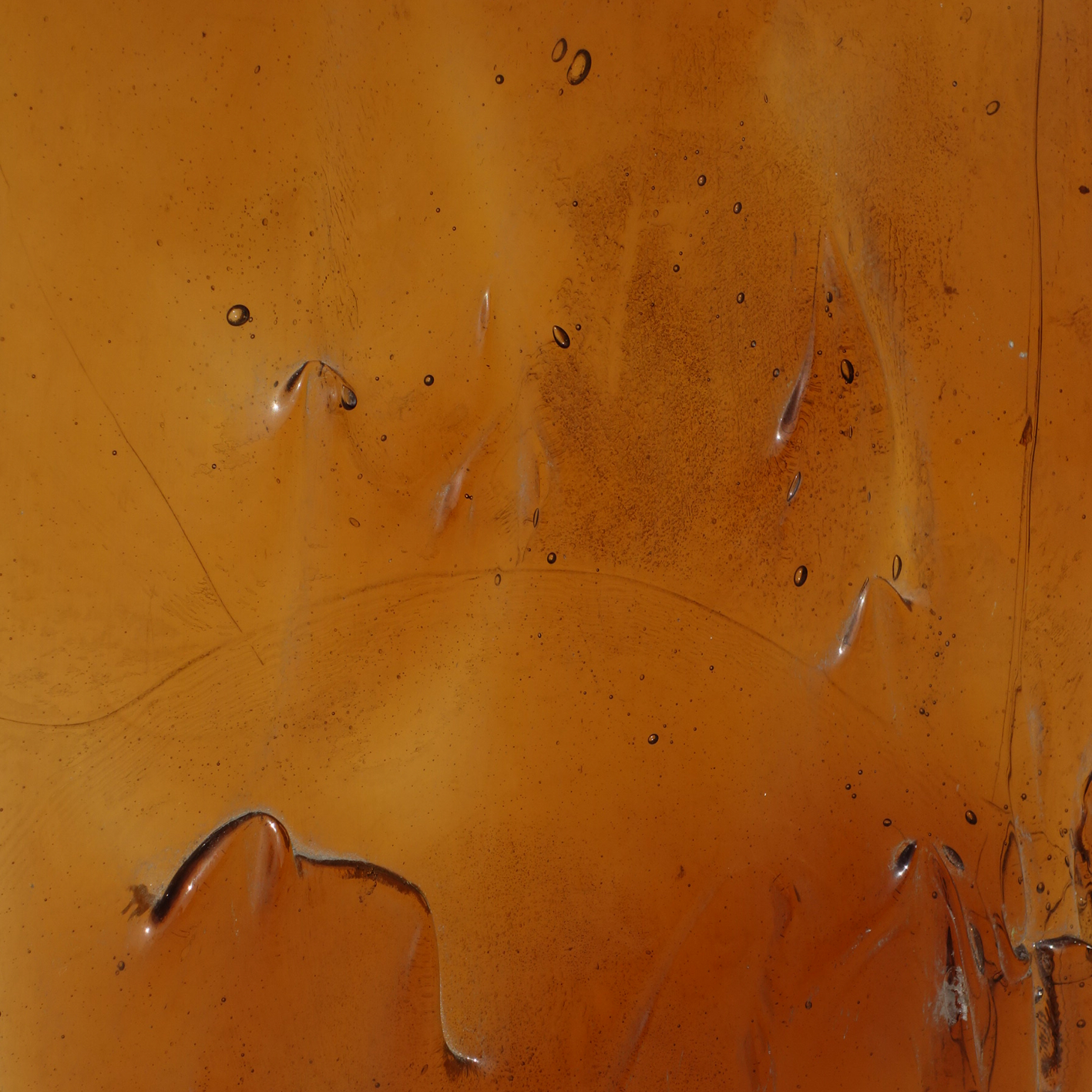 Orange pressed glass panel produced by Val Saint Lambert