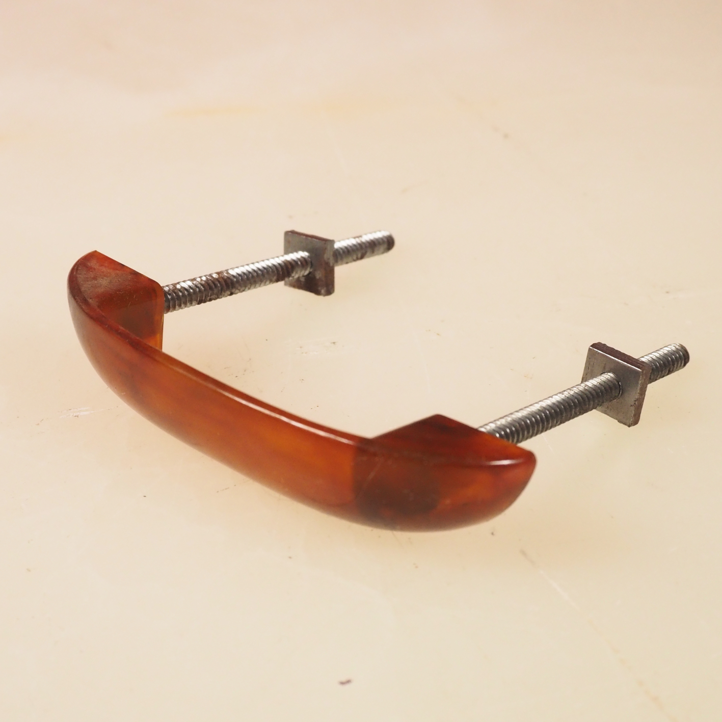 Amber galalith cabinet handle (ca. 1930)