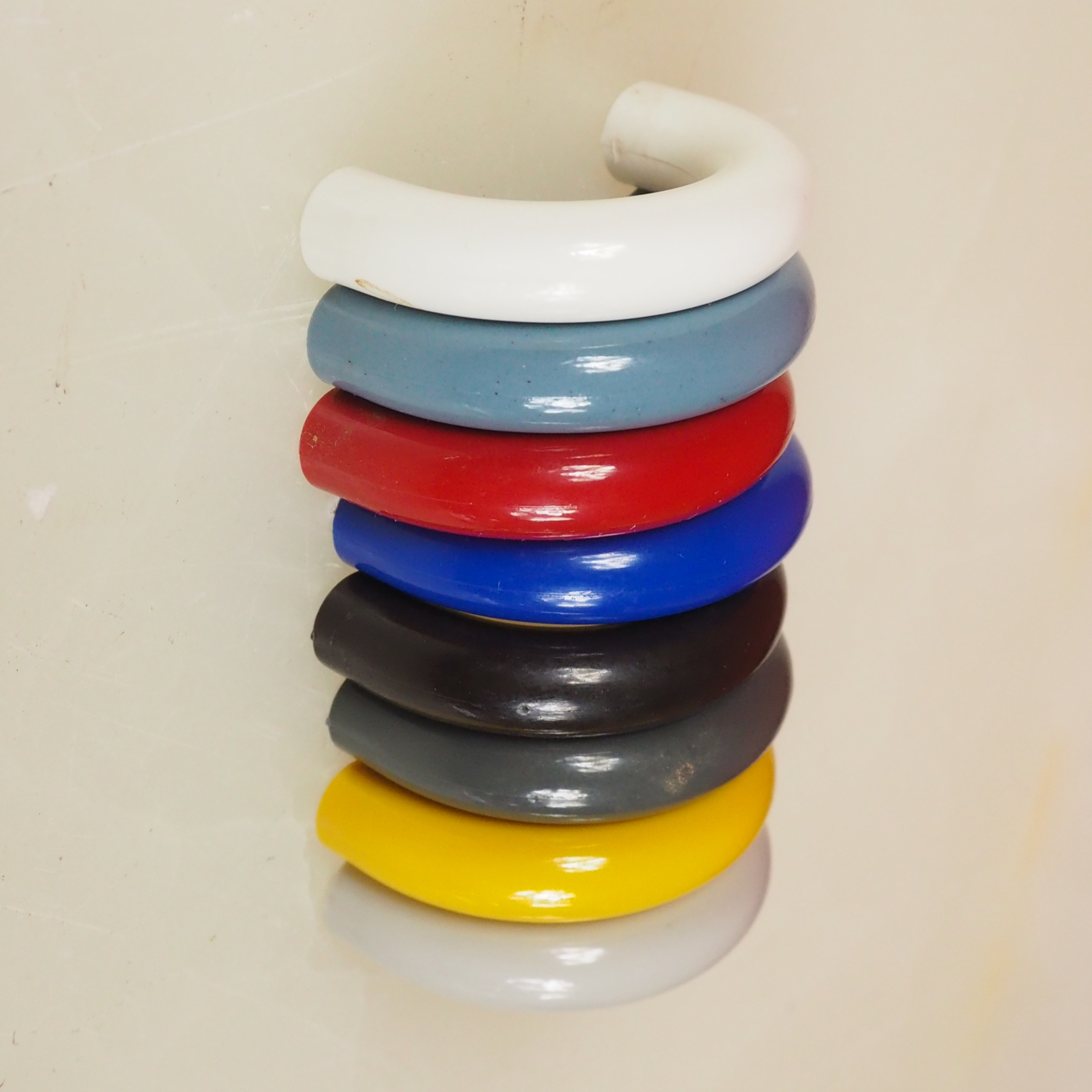 Colourful cabinet handle in plastic
