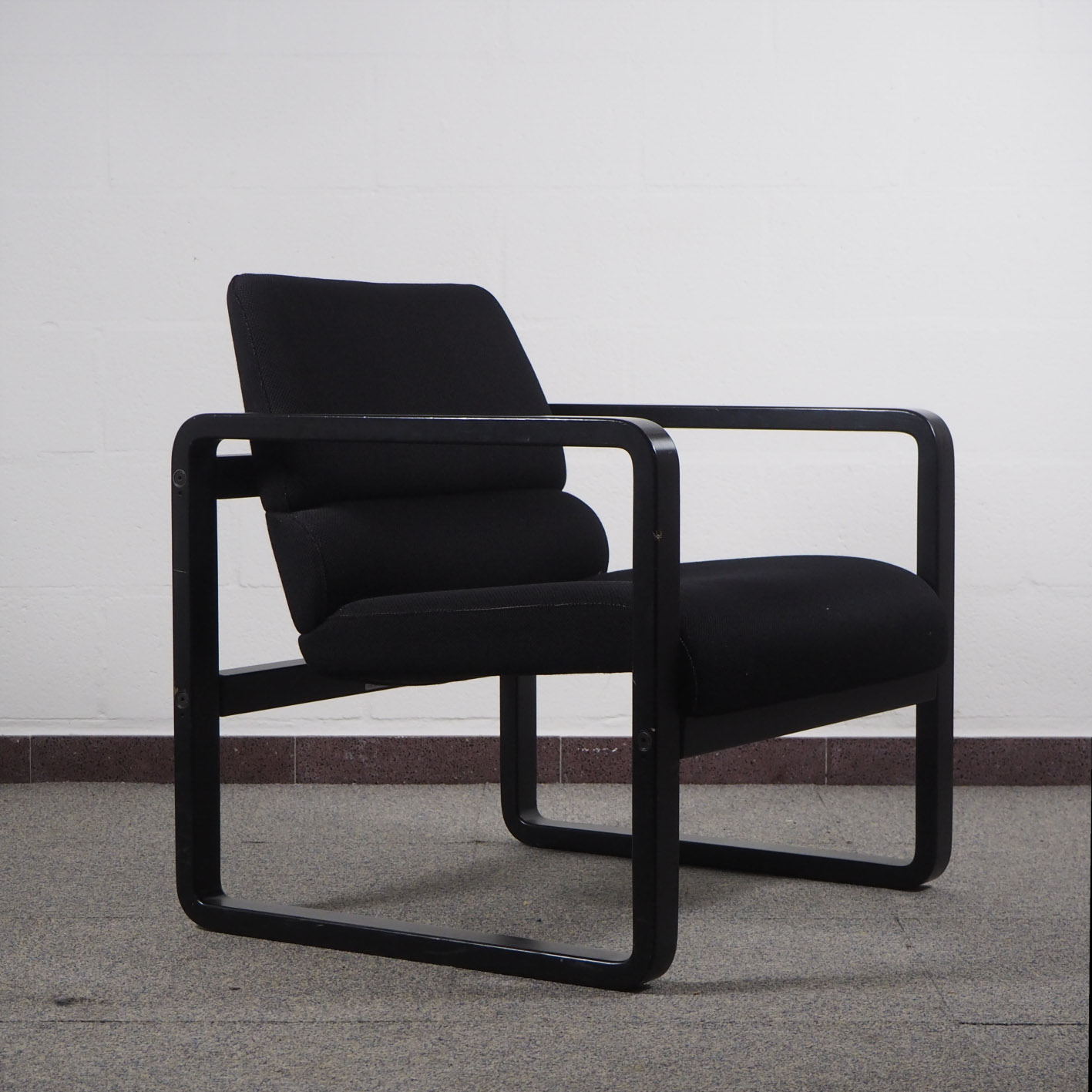 Black armchair by Martin Stoll