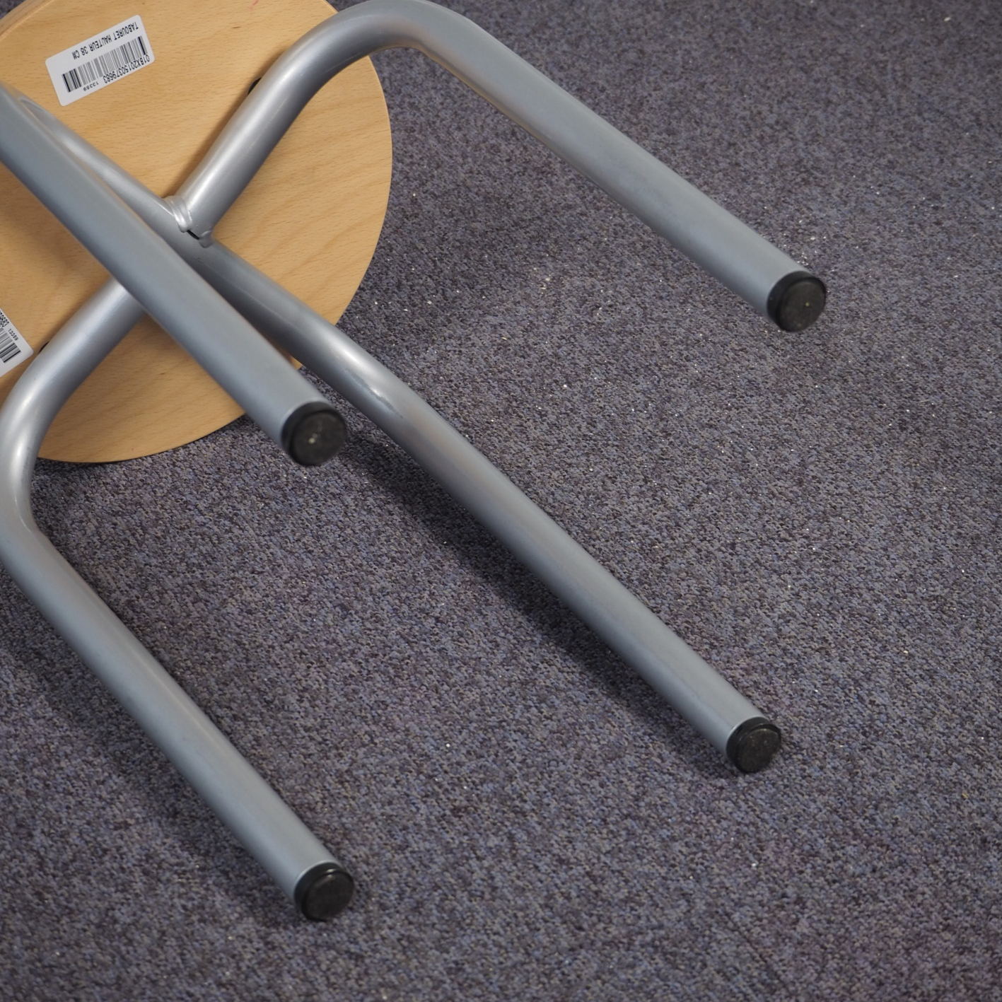 Small school stool with steel legs