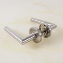 Door handle in stainless steel with key rosettes