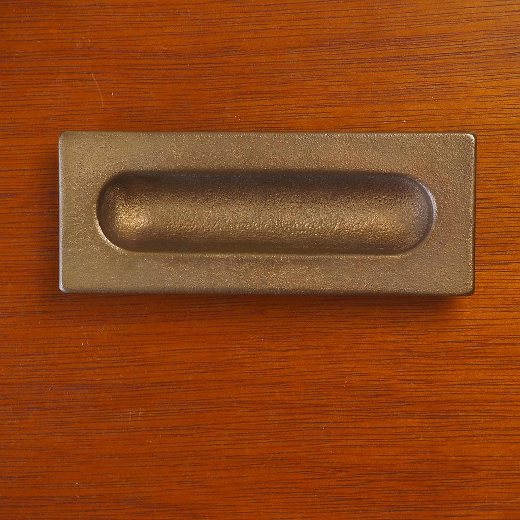 Inset cabinet handle in solid bronze by Jules Wabbes (ca. 1970)