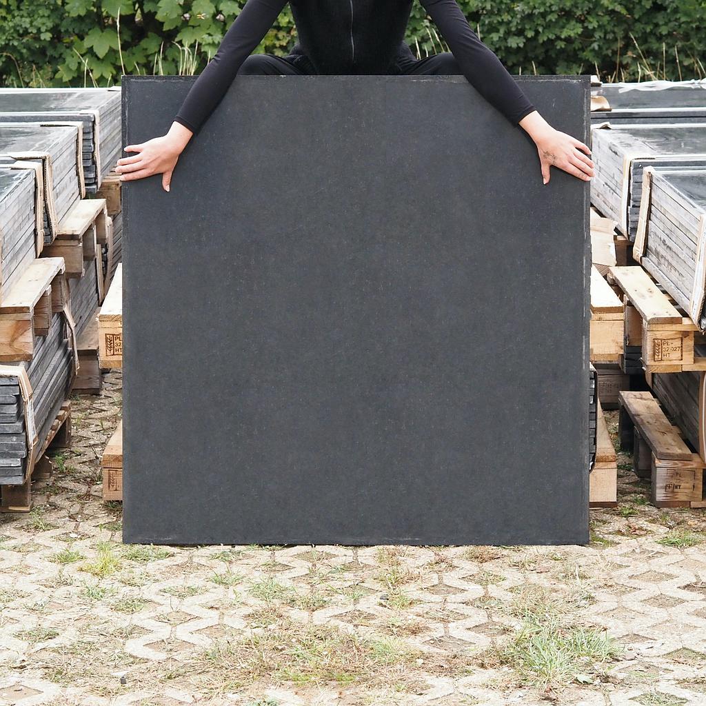 Square slab in black gabbro from the Montparnasse train station complex (115 x 115 cm)