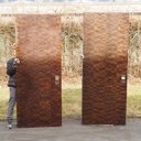 Large door with quilted tropical wood veneer and bronze door handles by Jules Wabbes (H. 252,2 x 101 cm)