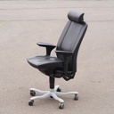 Swivel office armchair in black synthetic leather by Kinnarps