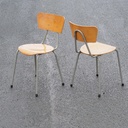 Chair in plywood and lacquered steel
