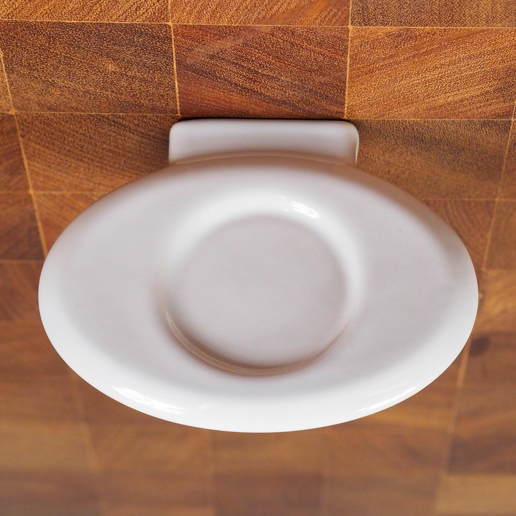 Wall glass holder in glazed porcelain by Boch Frères