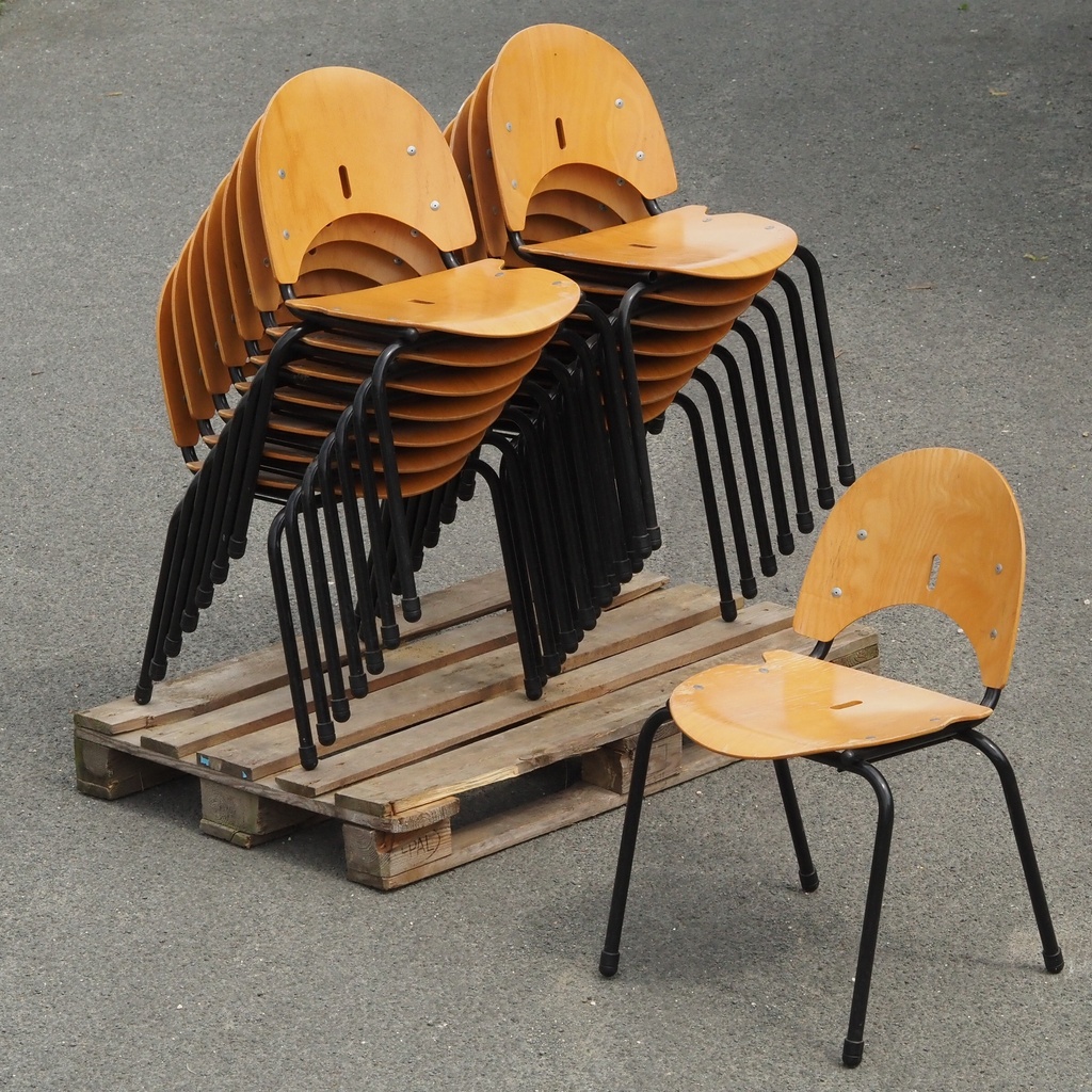 Stackable chair in varnished beech plywood and powder coated steel