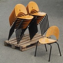 Stackable chair in varnished beech plywood and powder coated steel