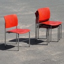 Stackable chair in red plywood by Kusch+Co
