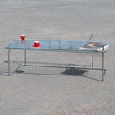 Coffee table in chromed tubular steel with clear glass tabletop (121 x 62 cm)