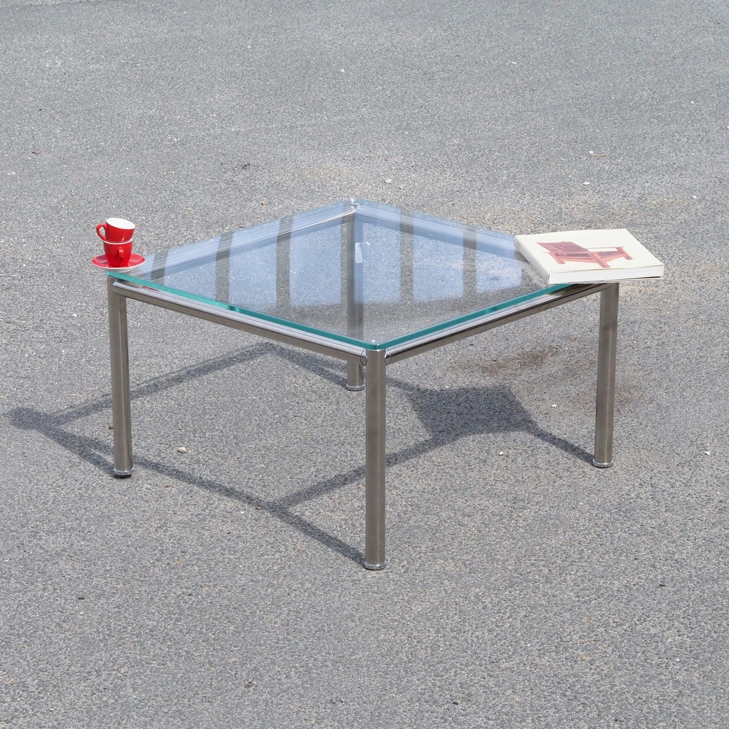 Square coffee table in chromed aluminium with clear glass tabletop by Smaris (80 x 80 cm)