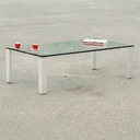 Coffee table in brushed aluminium with clear glass tabletop (140 x 70 cm)