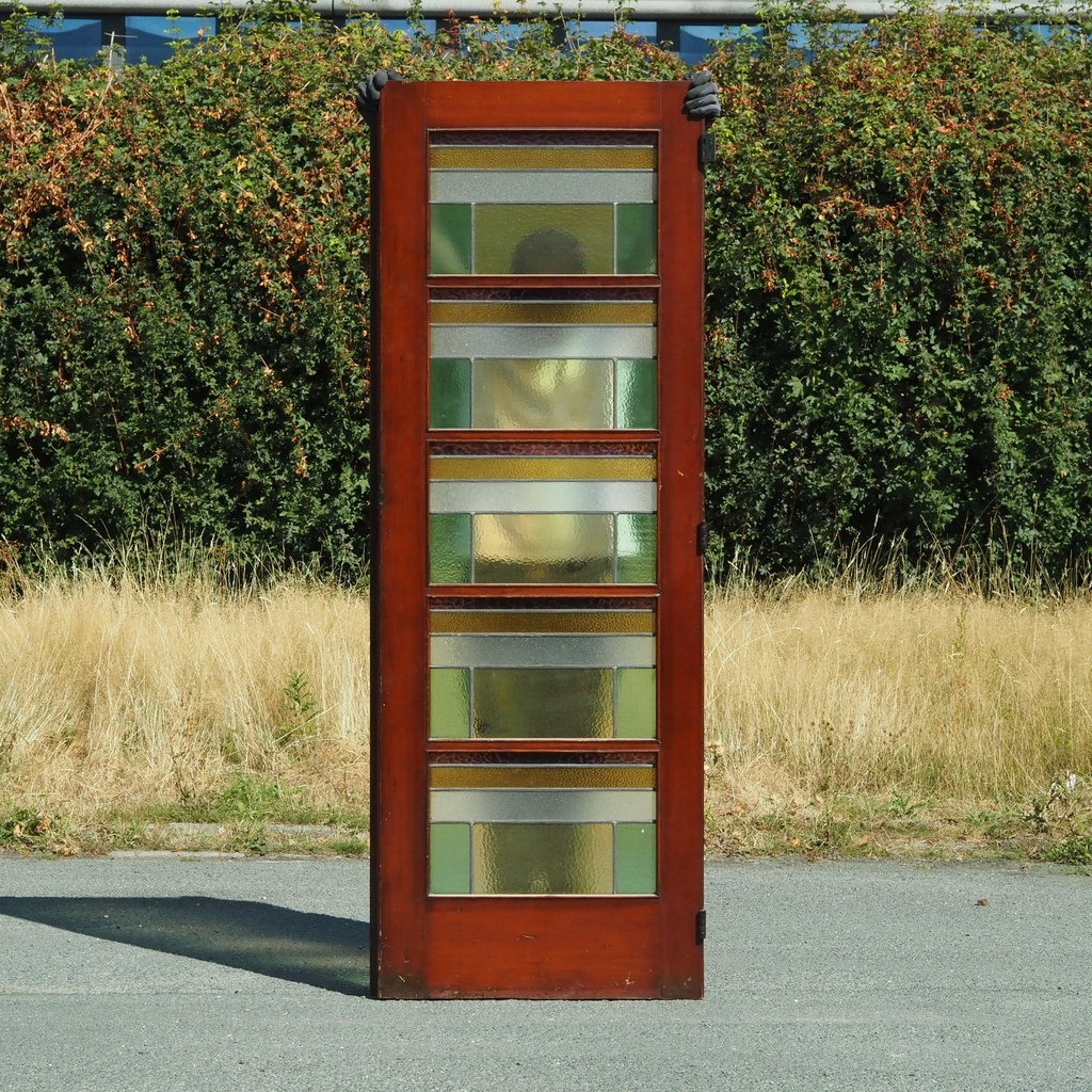 Door panel in pitch pine with stained glass panels (H. 203 x W. 71 cm)