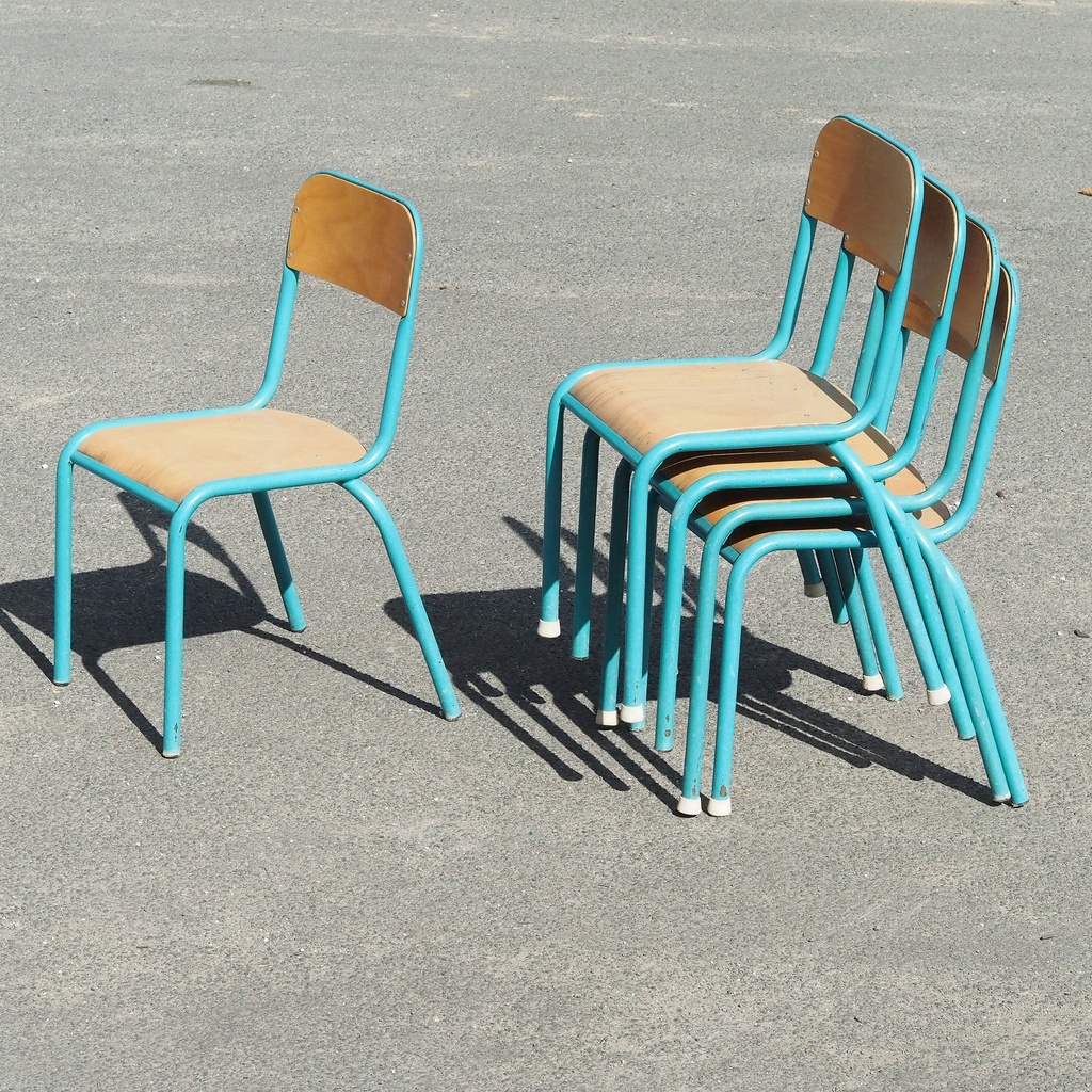 Stackable chair in powder coated steel and beech plywood
