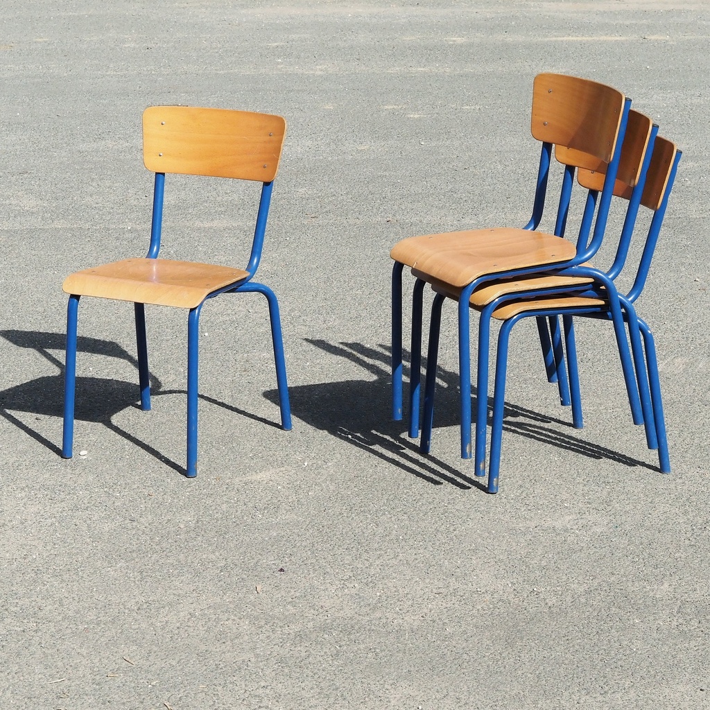 Stackable school chair in dark blue powder coated steel and beech plywood