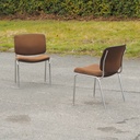 Conference chair in chromed steel and upholstered in brown fabric (ca. 1970)
