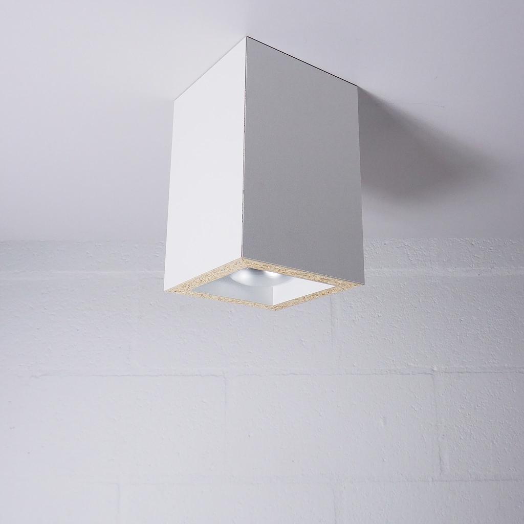Downlighter 'Karel' in white particle board with exposed edges