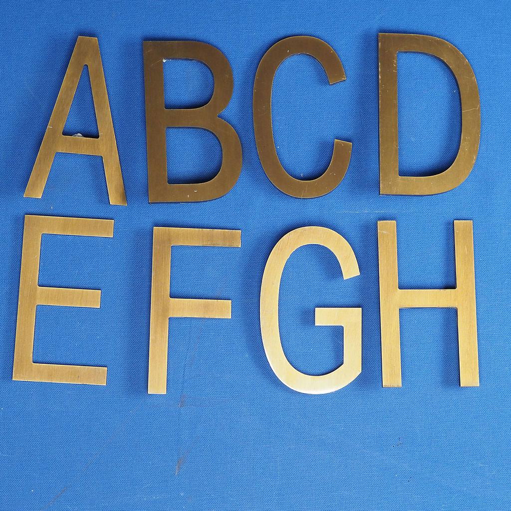 [005HAR0053] Set of signage letters 'A to H' in brass by Jules Wabbes from the Générale de Banque