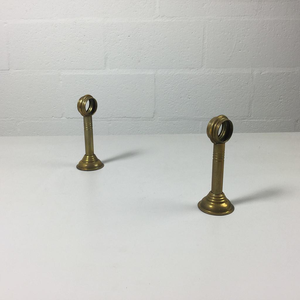 Pair of mounts in brass curtain rods