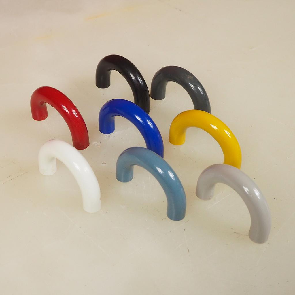 Colourful cabinet handle in plastic