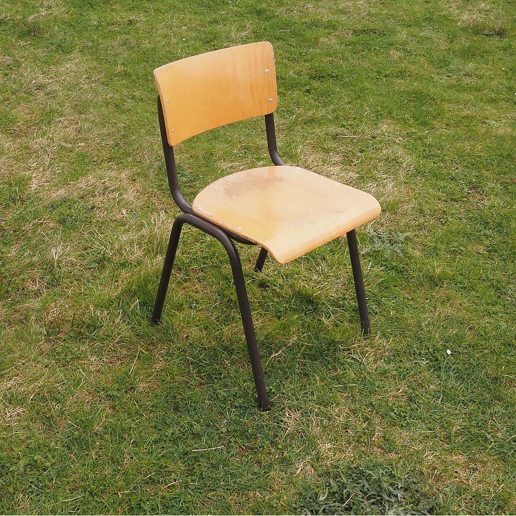Stackable school chair in beech plywood and steel tube legs