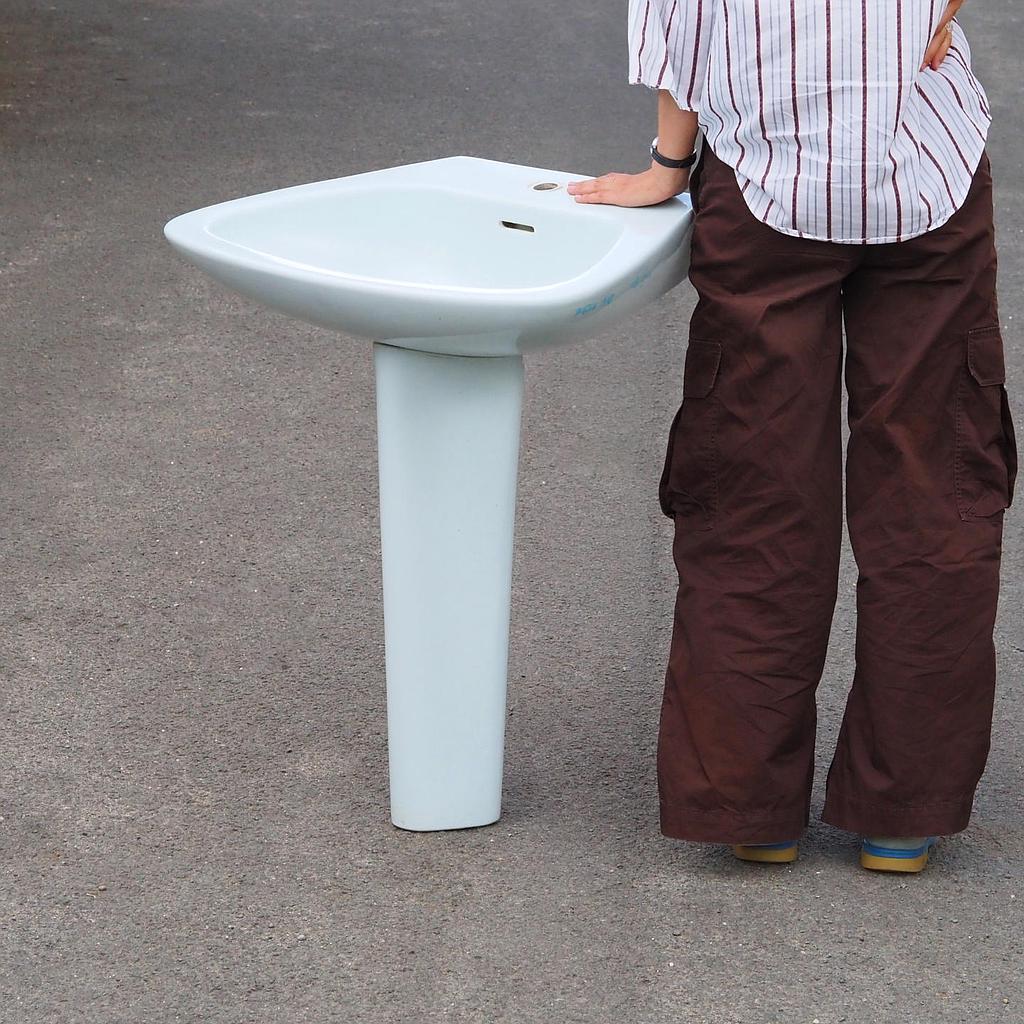 Blue pedestal bathroom sink by Pozzi