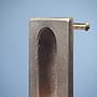 Small inset cabinet handle in solid bronze by Jules Wabbes