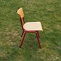 Stackable school chair in beech plywood and powder-coated steel legs