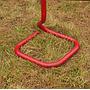 Coat rack in red coated bent steel